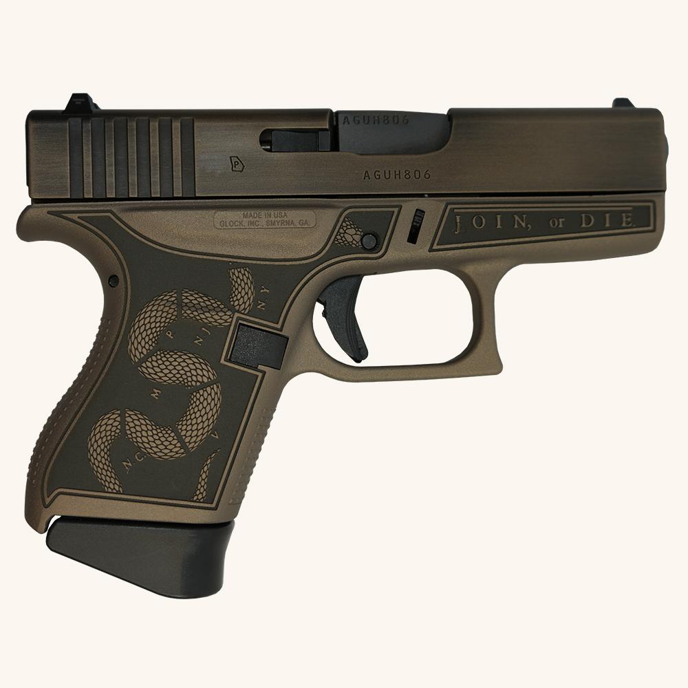 Custom engraved pistol with snake design