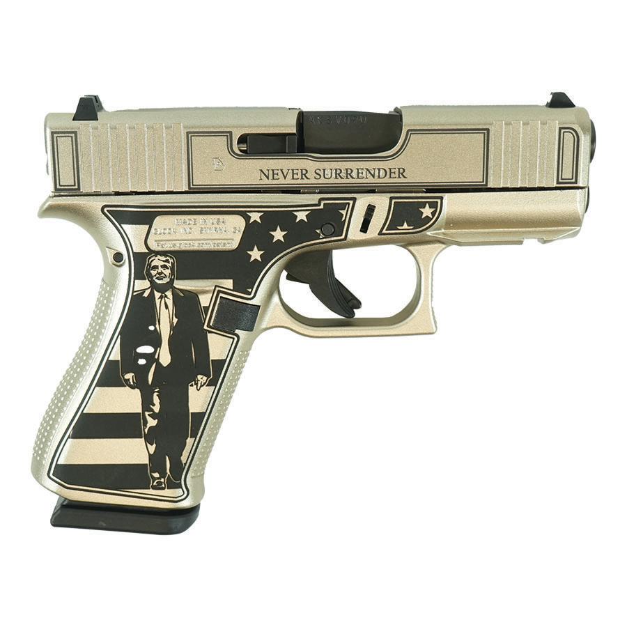 Decorative handgun with 'Never Surrender' engraving.