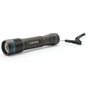 Black flashlight with wrist strap on white background.