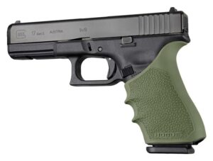 Black handgun with olive green grip.