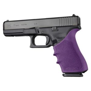 Handgun with purple grip, side view.