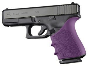 Handgun with purple grip handle, side view