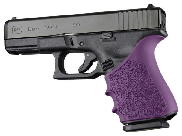 Handgun with purple grip handle, side view