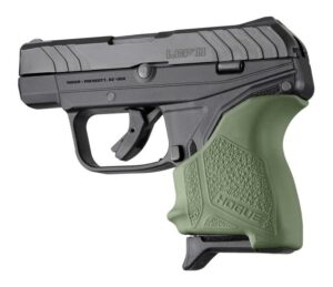 Ruger LCP II handgun with green grip