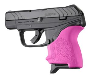 Black handgun with pink grip