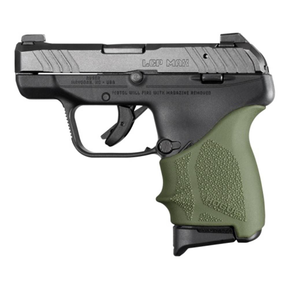 Pistol with green grip, side view.