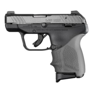 Black handgun side view on white background.