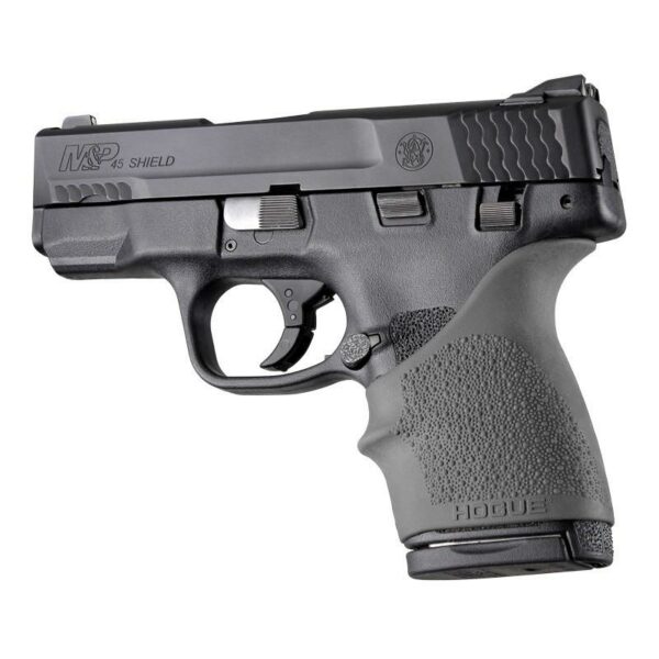 Black handgun with textured grip, side view.