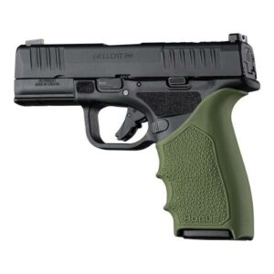 Black handgun with green textured grip.