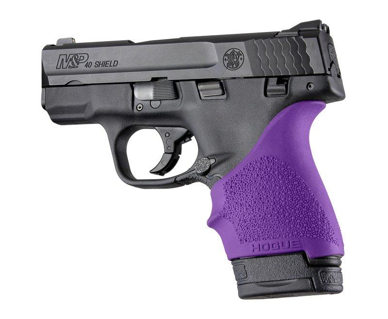 Compact handgun with a purple grip.