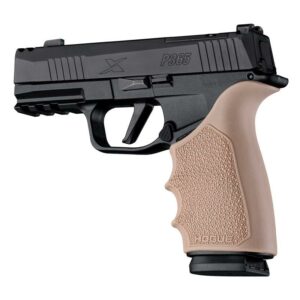 Black handgun with tan grip handle close-up