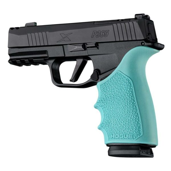 Black handgun with teal grip handle