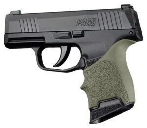 Compact handgun with textured grip and sleek design.