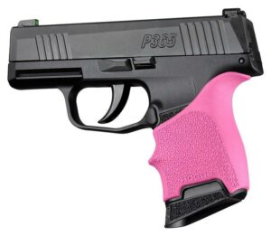 Black handgun with pink grip