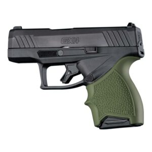 Compact black and green pistol, side view.