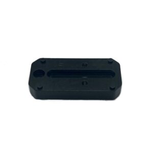 Black rectangular mechanical part with screw holes.