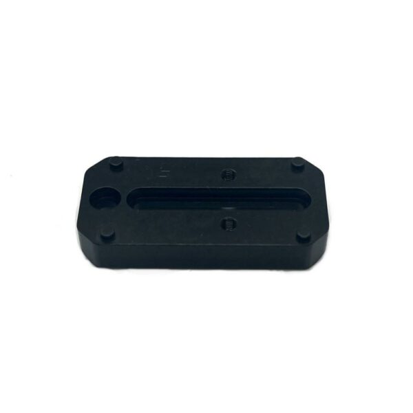 Black rectangular mechanical part with screw holes.