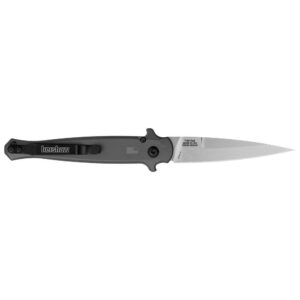 Sleek folding knife with black handle and sharp blade.