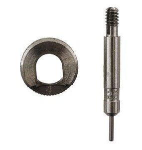 Metal reloading die components on white background.