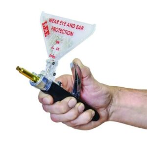 Hand holding reloading tool with funnel attachment.