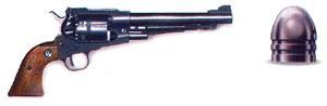 Revolver with a bullet on white background