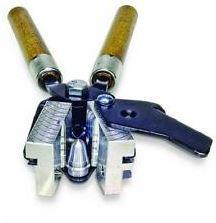 Bullet casting mold with two wooden handles.