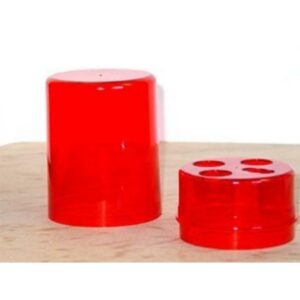 Red plastic magic cups on wooden surface.