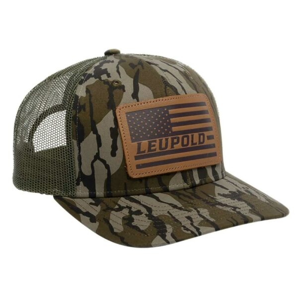Camouflage cap with American flag patch.