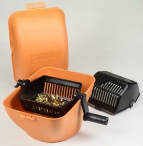Orange media separator with cartridge casings inside.