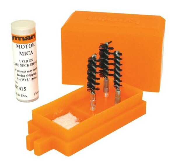 Cleaning kit with brushes and compound.