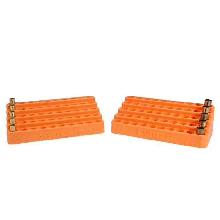 Orange cartridge blocks with bullet holders.