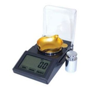 Digital pocket scale with gold weighing pan