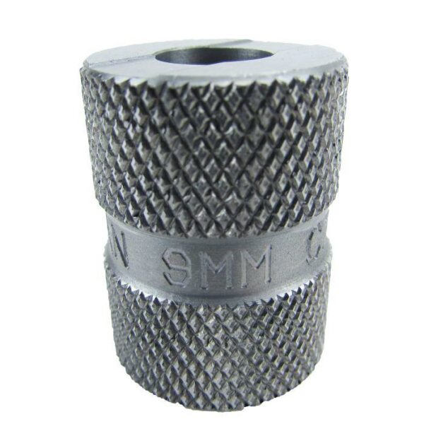 Textured metal cylinder with '9MM' marking.