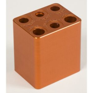 Orange aluminum block with six holes.