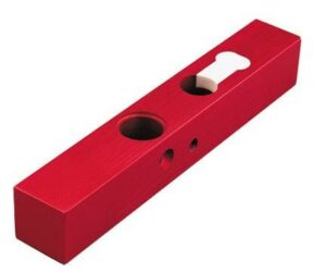 Red wooden flute with holes and mouthpiece