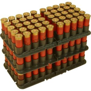 Stack of red and gold shotgun shells in tray.