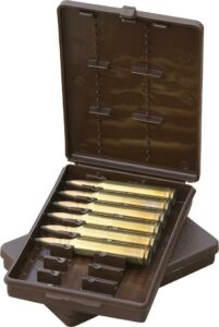 Rifle ammunition in a brown case, top view.