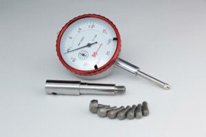 Dial gauge with metal parts, precision measurement tool.