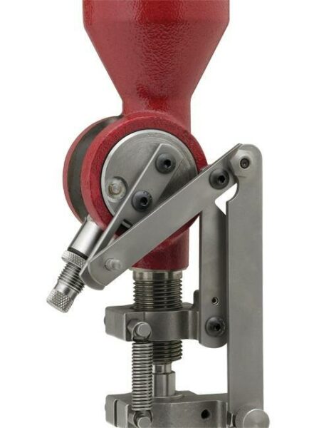 Red and metal mechanical device, close-up view.