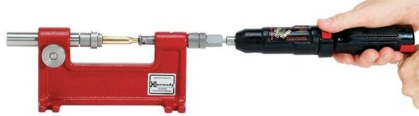 Hand tool with red bench press for reloading.