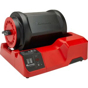 Red and black rotary drum tumbler machine.