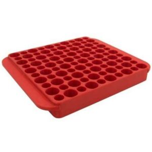 Red silicone square baking mold with circular cavities.
