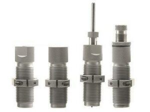 Four gray metal reloading dies in a row.