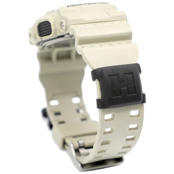Beige watch with black rubber buckle