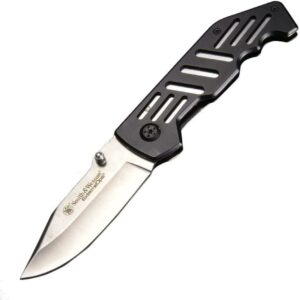 Black folding tactical pocket knife on white background.