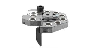 Industrial hexagonal adapter plate with multiple threaded holes.