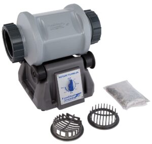Rotary tumbler machine with accessories and packet.