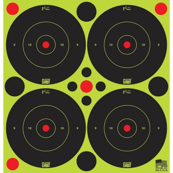 Four black shooting targets on green background.