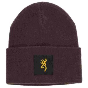 Brown beanie with yellow logo patch.