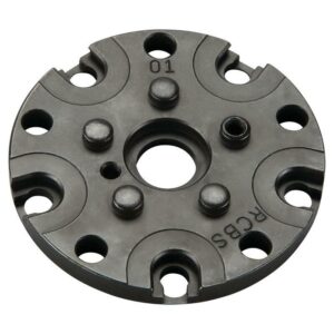 Metal circular disc with grooves and holes.